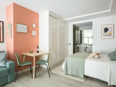 Cama o camas de una habitación en Bello estudio en el corazón de Las Palmas GB1C