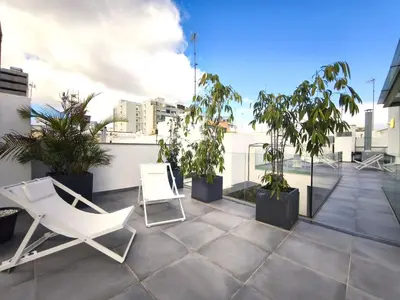Un balcón o terraza de Apartamento moderno en centro historico GB2A