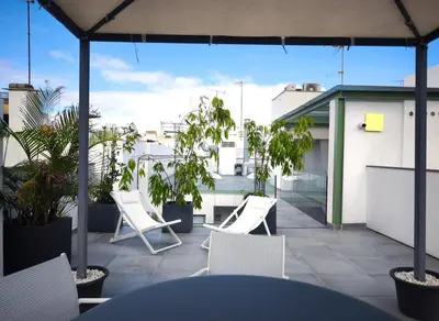 Un balcón o terraza de Apartamento moderno en centro historico GB2A