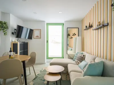 Una televisión o centro de entretenimiento en Apartamento moderno en centro historico GB2A