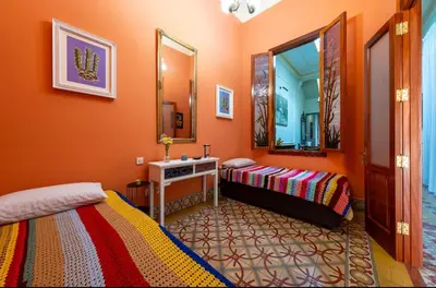Cama o camas de una habitación en Triana modernista
