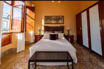 Cama o camas de una habitación en Triana modernista