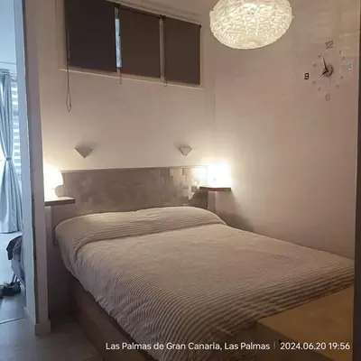 Cama o camas de una habitación en Apartament with one room in privileged place in vibrant and cosmopolitan city