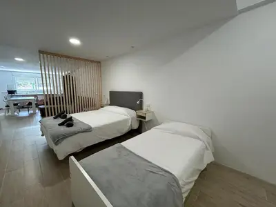 Cama o camas de una habitación en Las Tabaibas beach house
