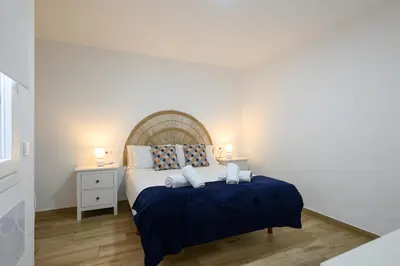 Cama o camas de una habitación en Gloria Beach Apartment