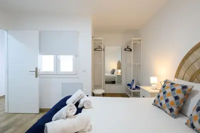 Cama o camas de una habitación en Gloria Beach Apartment