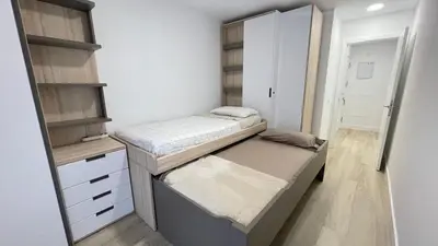Cama o camas de una habitación en Albareda 83