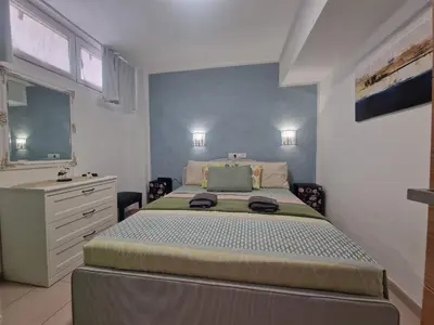 Cama o camas de una habitación en Lapo Apartments Yumbo Center