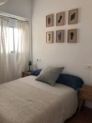 Cama o camas de una habitación en Rooftop City Center LPA