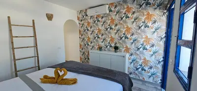 Cama o camas de una habitación en Playmar Relax