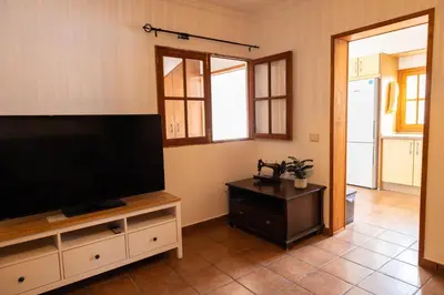 Una televisión o centro de entretenimiento en Casa Salvador