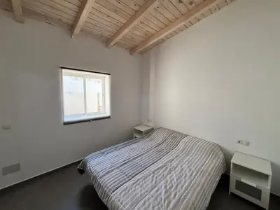 Cama o camas de una habitación en Vivienda Vacacional Carla 2