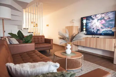 Una televisión o centro de entretenimiento en Bergeli Oasis