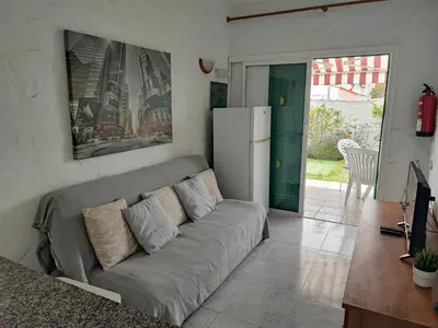Zona de estar de private Bungalow next to Yumbo Center