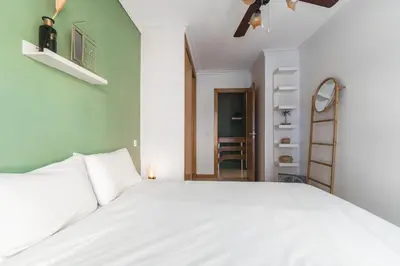 Cama o camas de una habitación en Home2Book Trendy Apt in Las Palmas Center