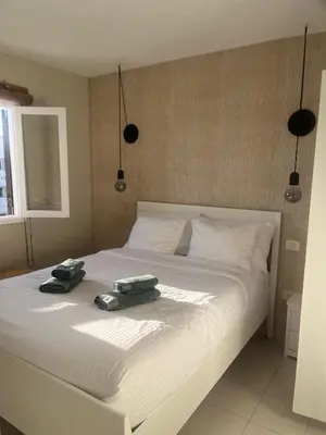 Cama o camas de una habitación en Yumbo Habitat