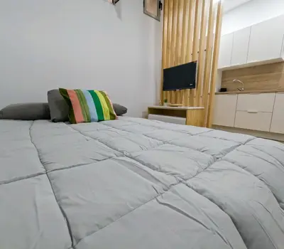 Cama o camas de una habitación en Alma Home
