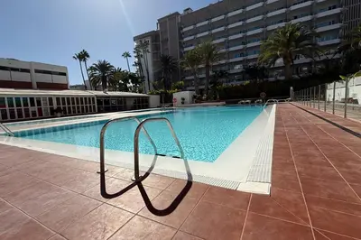 Piscina en o cerca de Apartamentos Danubio, Modernes Apartment mit Poolblick und seitlichem Meerblick, Wohnzimmer und 1 Schlafzimmer, 4 Etage, im Herzen von Playa del Inglés, Gran Canaria