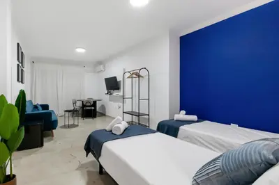 Cama o camas de una habitación en Large Attic Las Canteras Rooms - Only adults