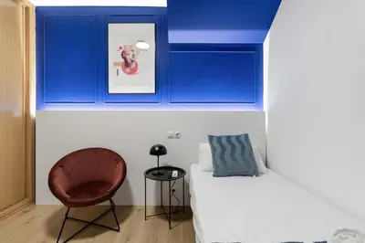 Cama o camas de una habitación en Large Attic Las Canteras Rooms - Only adults