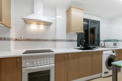 Una cocina o zona de cocina en Large Attic Las Canteras Rooms - Only adults