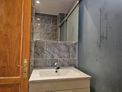 Un baño de Barbados Tirajana Two Bedroom Apartment