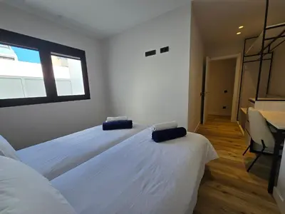 Cama o camas de una habitación en VV Almansa Canteras I 