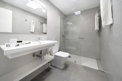 Un baño de Apartamentos Los Papagayos