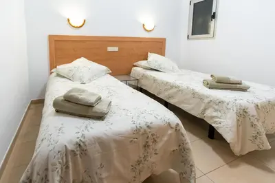 Cama o camas de una habitación en Endorfita Sonrisa Beach - Canteras & Ocean View
