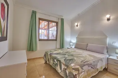Cama o camas de una habitación en Santa Barbara Tropical