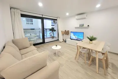 Una televisión o centro de entretenimiento en Arguineguin Sun Beach