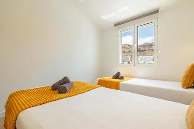 Cama o camas de una habitación en HORIZON VACATION HOME - Yucatán Coastal Oasis