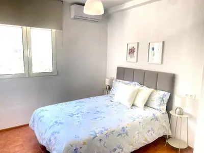 Cama o camas de una habitación en Charming And Cozy House in Agaete