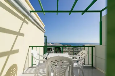 Un balcón o terraza de Salt Apartments Green Ocean