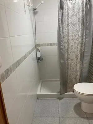 Un baño de Vacacional Playa Las Canteras