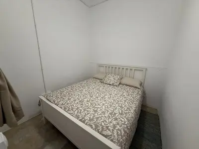 Cama o camas de una habitación en Town House Near The Beach