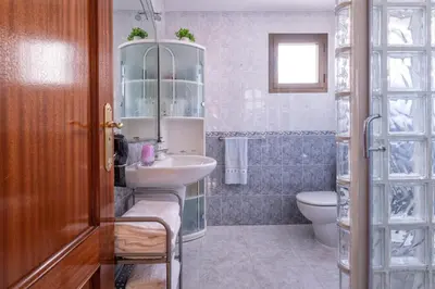 Un baño de Dúplex Mika en Playa de Arinaga