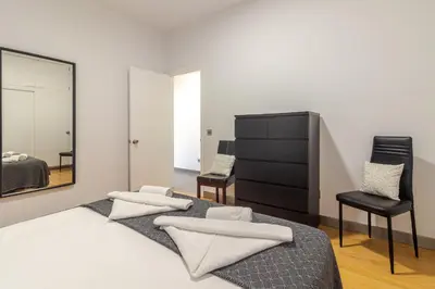 Cama o camas de una habitación en Seafront Terrace Apartment Las Canteras