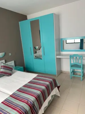 Cama o camas de una habitación en SOL VELEROS Puerto Rico Apartement