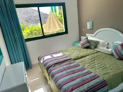 Cama o camas de una habitación en SOL VELEROS Puerto Rico Apartement