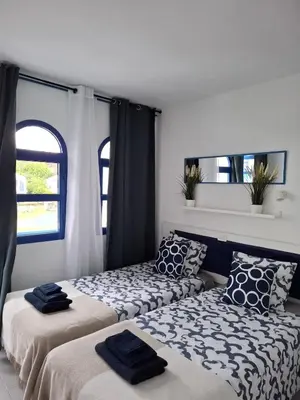 Cama o camas de una habitación en Casa Romantico - Playmar - Maspalomas