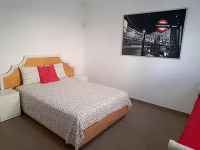 Cama o camas de una habitación en Beach House Arinaga