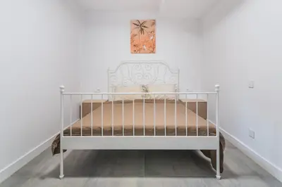 Cama o camas de una habitación en Playa de las Mujeres