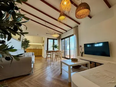 Una televisión o centro de entretenimiento en Vera Beach House