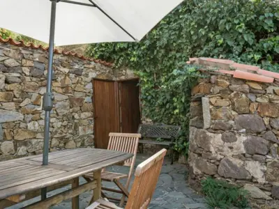 Un patio o zona al aire libre en Rural house in the center of Gran Canaria 2 noches