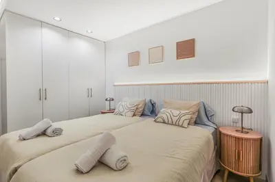 Cama o camas de una habitación en Skyline Beachfront Retreat