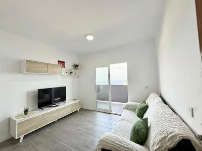 Una televisión o centro de entretenimiento en GD House cielo & mar