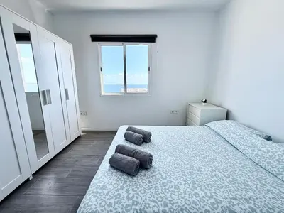 Cama o camas de una habitación en GD House cielo & mar