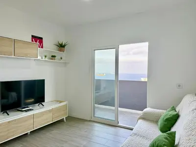 Una televisión o centro de entretenimiento en GD House cielo & mar