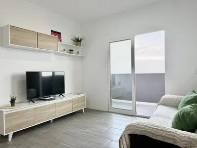 Una televisión o centro de entretenimiento en GD House cielo & mar